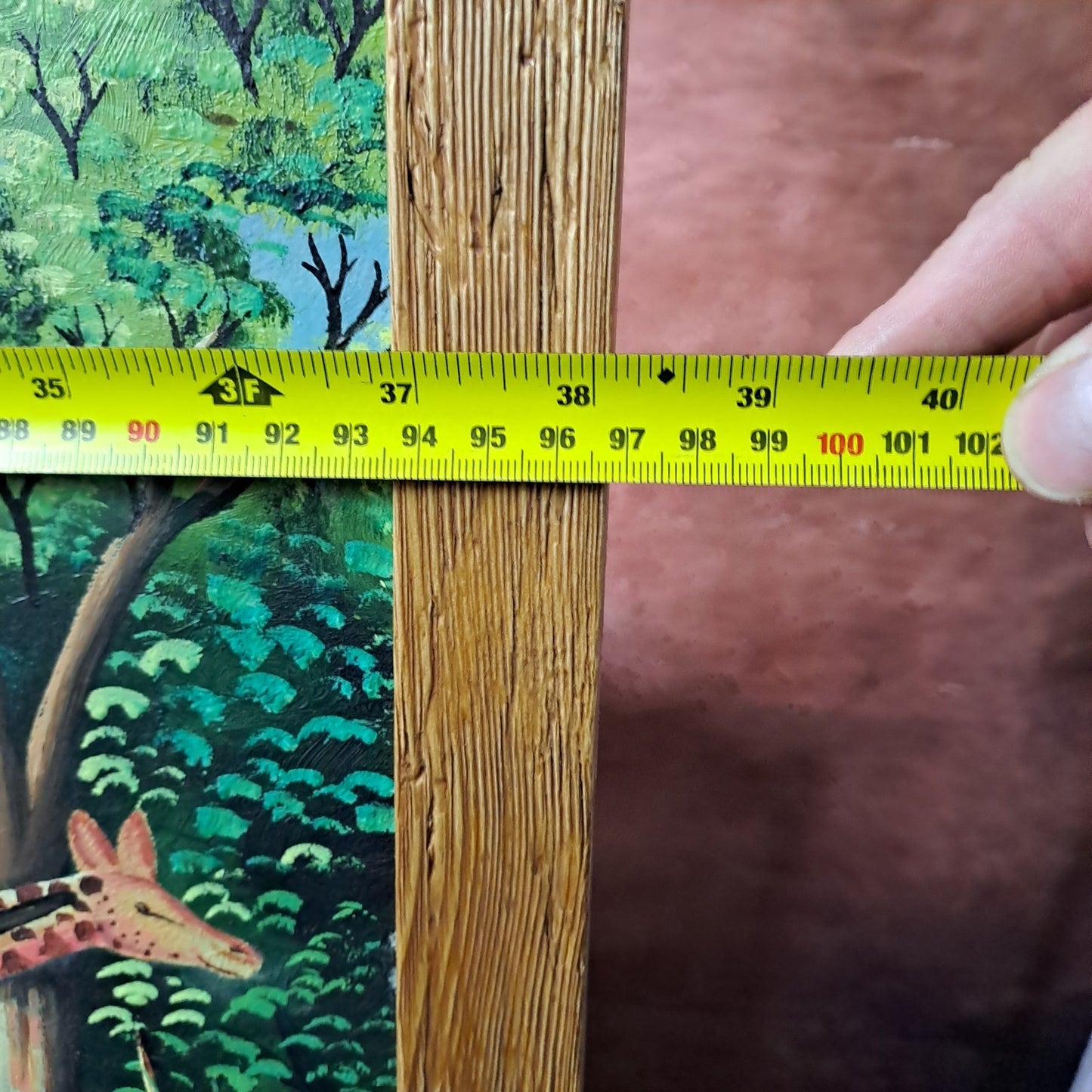 RODRIGUE MERVILUS (b.1947) Oil on Board "Colourful jungle scene w/ wild animals"