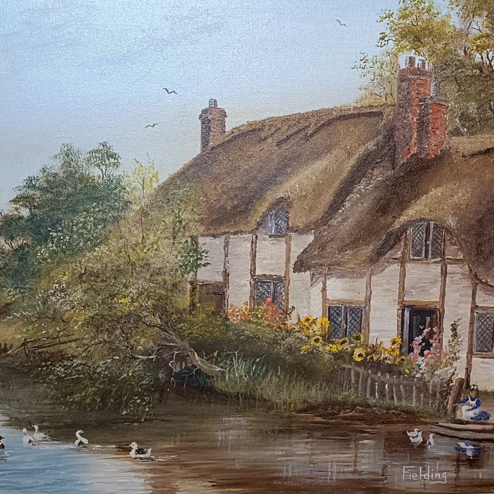Framed original oil painting of Thatch Cottage on River Nadder by Curated Treasures, showcasing detailed countryside scenery.