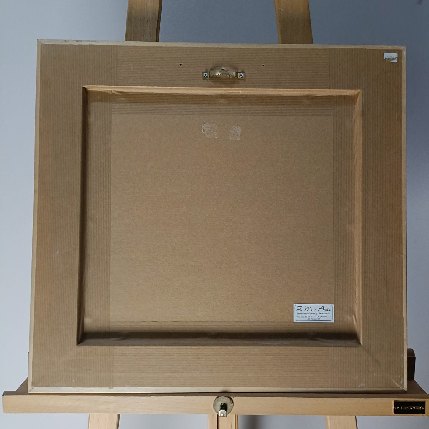 Framed signed oil painting of a seated ballerina titled "Seated Ballerina II" by Marisa Mallol, displayed in a stylish frame.