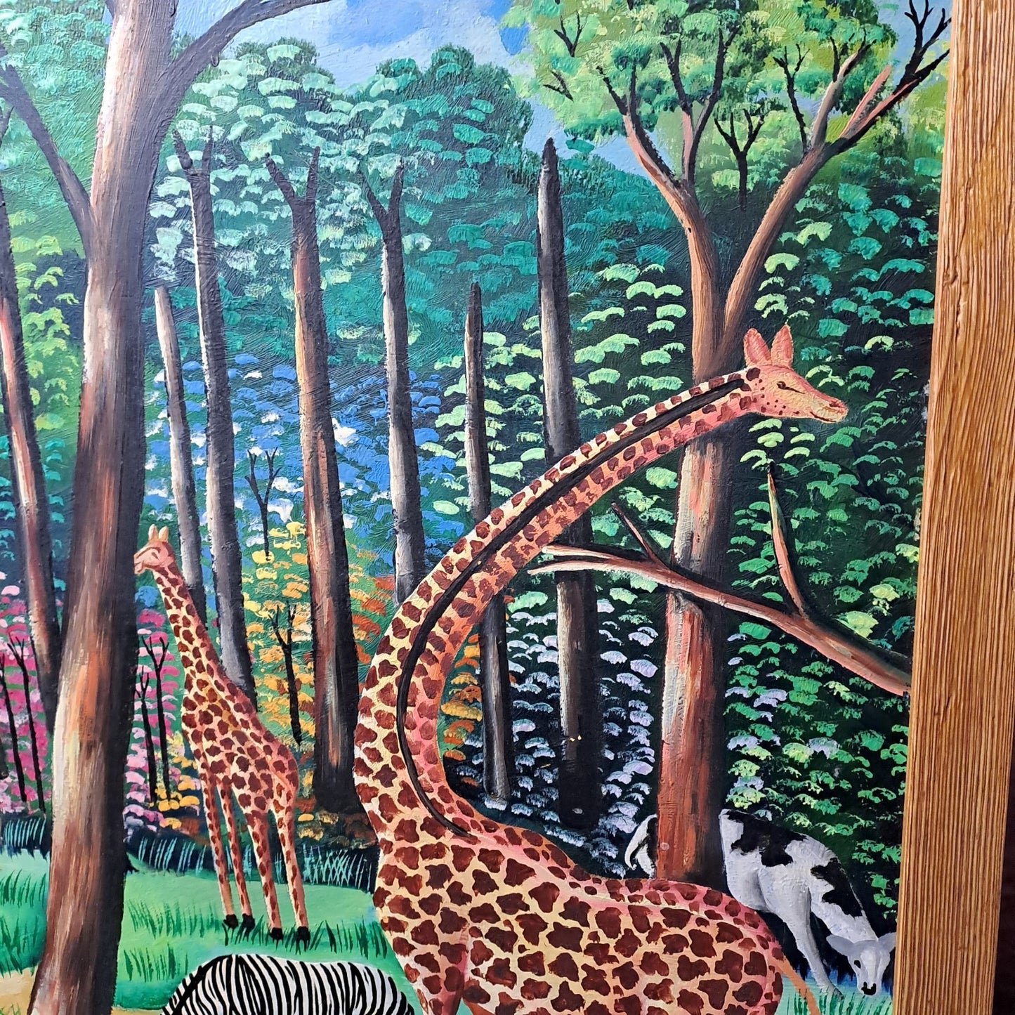 RODRIGUE MERVILUS (b.1947) Oil on Board "Colourful jungle scene w/ wild animals"
