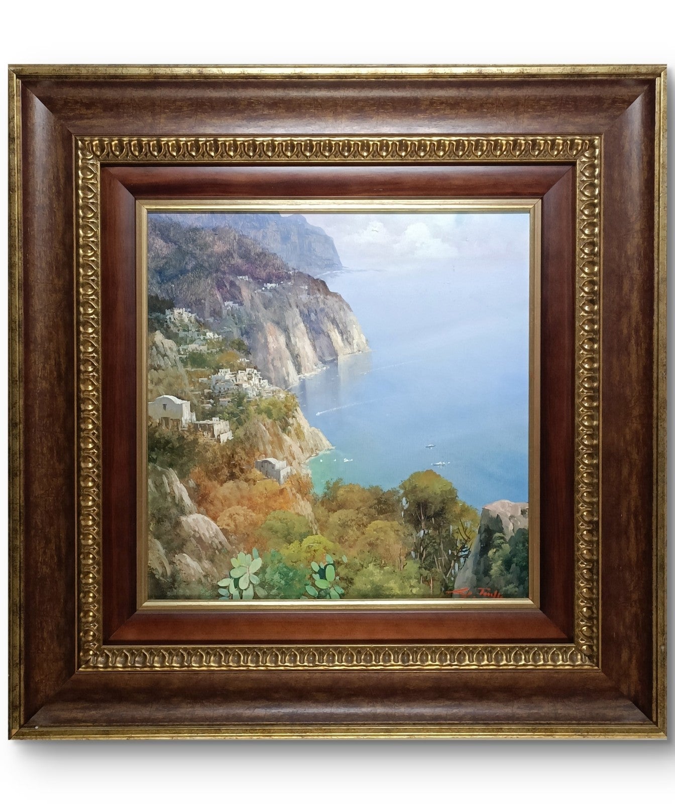 Signed framed original oil painting by Giuseppe Torella depicting the scenic Amalfi Coast, with vibrant colors and detailed coastal landscape.