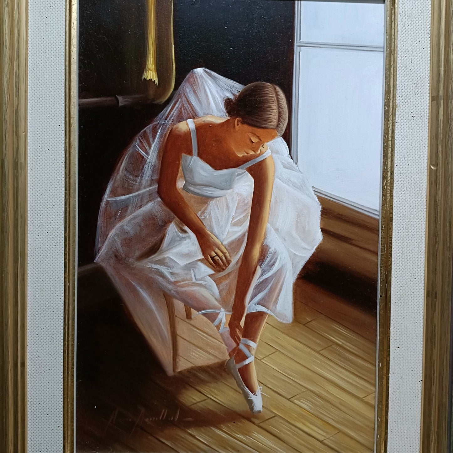 Framed signed oil painting of a ballerina by the window by Marisa Mallol, displayed in a decorative frame.
