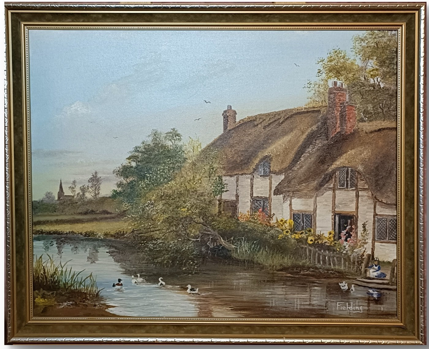 Framed original oil on canvas artwork by Curated Treasures featuring Thatch Cottage on River Nadder landscape scene.